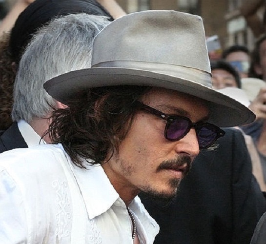 johnny depp blow sunglasses. Johnny Depp wearing a cool hat