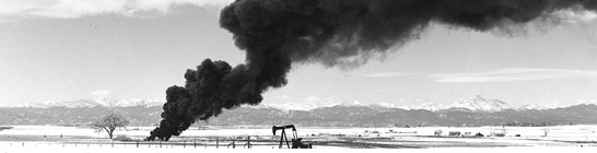 Robert Adams photography of smoke, oil, a fire, and cloud
