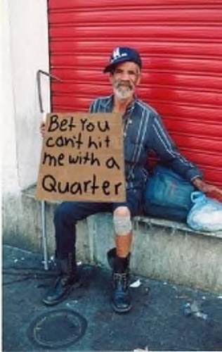 man with a homeless sign who can be struck for quarter